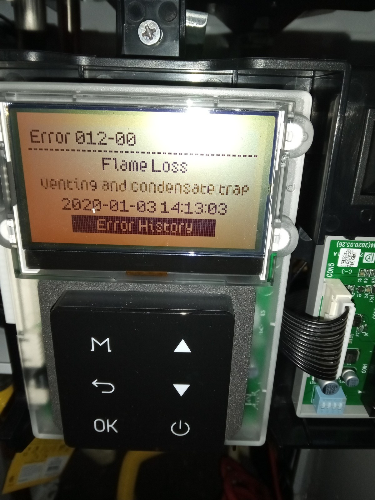 Tankless water heater service screen displaying Error 012-00 flame loss with the error history menu highlighted